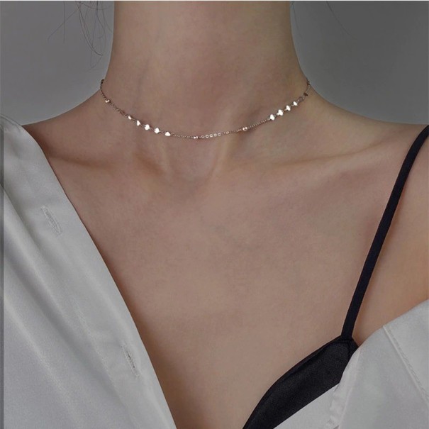 Gargantilla de mujer con corazones plateado