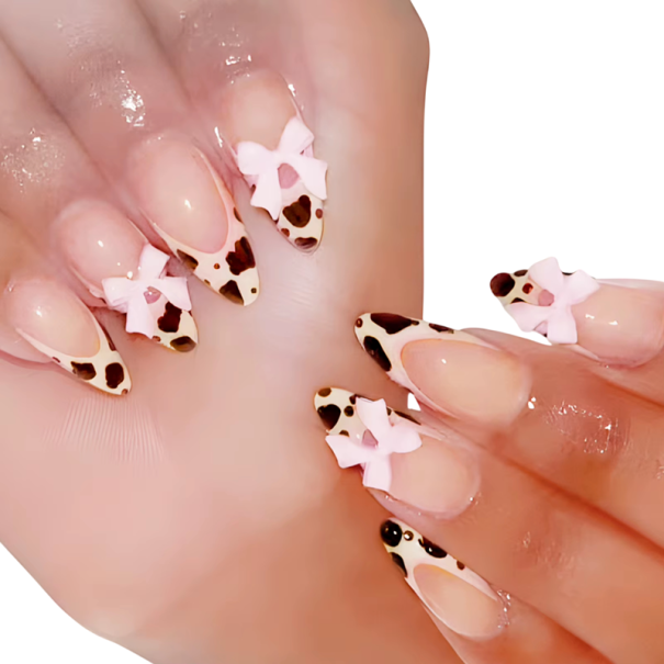 Gedeclareerde acryl nagels met koeienvlekkenpatroon 24 stuks Amandelvorm met 3D strikken Verschillende maten voor thuis- en salonmanicure 1