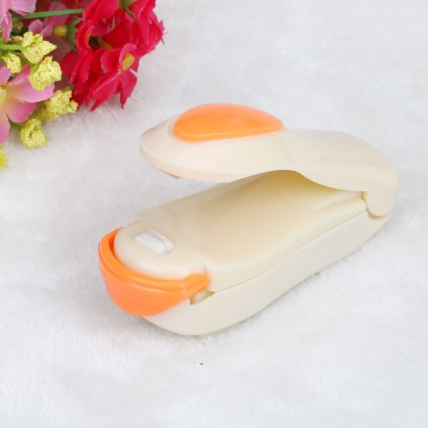 Gereedschap voor het sluiten van plastic zakken J2957 beige