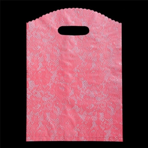 Geschenktüte mit Lochmuster 5-tlg rosa S