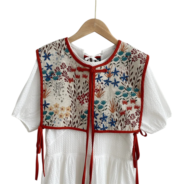Gilet da donna floreale con legatura taglia unica cotone cashmere beige bordatura rossa senza maniche per stratificazione 1