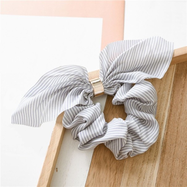 Gommette à cheveux avec un papillon 3