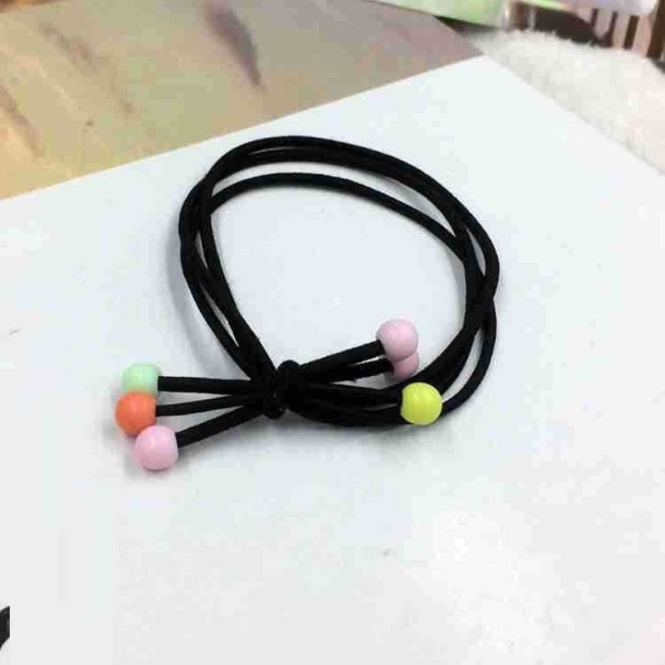 Gommette noire pour cheveux avec perles multicolore