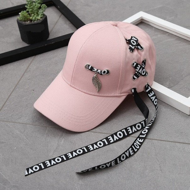 Gorra de mujer con cinta rosa
