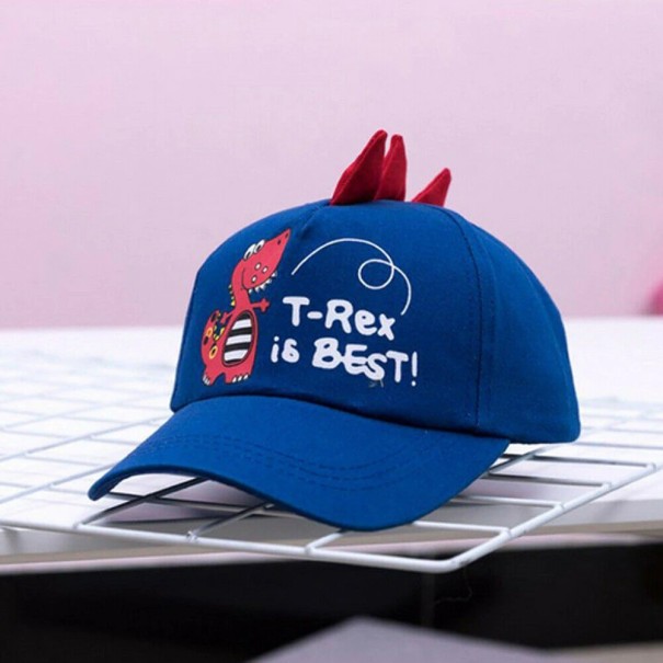 Gorra infantil con dinosaurio azul