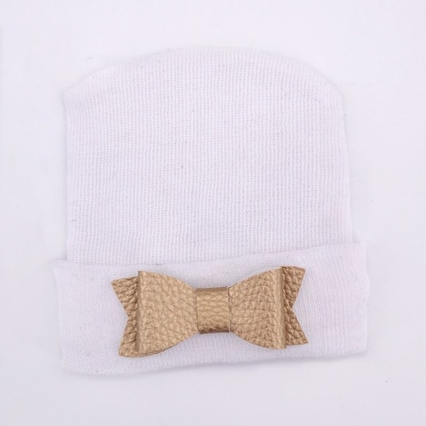 Gorro infantil blanco con lazo dorado