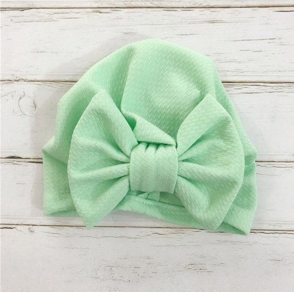 Gorro infantil con lazo A2 verde claro
