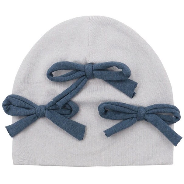 Gorro infantil con lazos 7