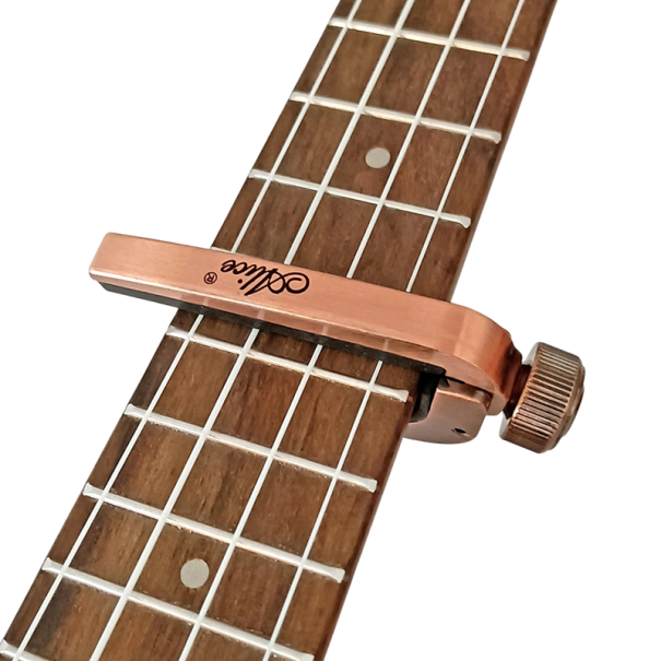 Guitar Capo Universal capo til akustisk og elektrisk guitar Fjedermekanisme Hurtig fastgørelse Musikalsk tilbehør kobberfarvet