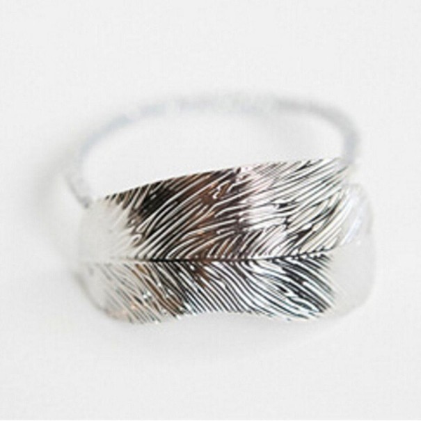 Haarelastiekje met metalen decoratie zilver