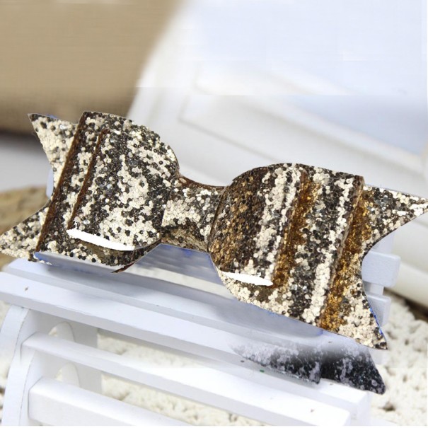 Haarspeld met glitterstrik goud