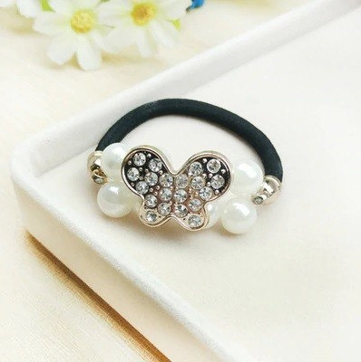 Hårband med pärlor och dekorationer 7