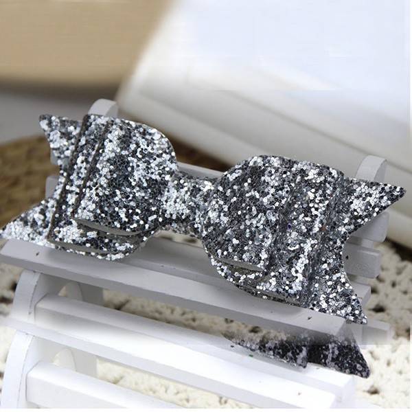 Hårklämma med glitterrosett silver