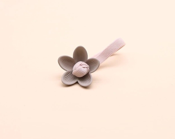 Hårslips med blomma A101 1