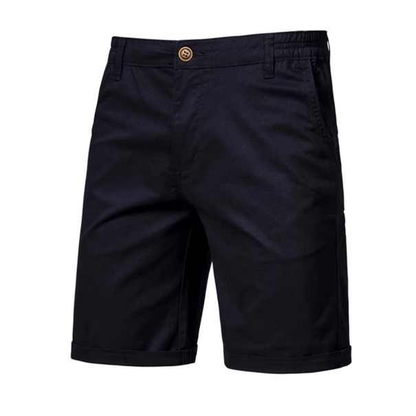 Herrshorts i bomull med resår i midjan. Avslappnade shorts i 100 % bomull med fickor. Bekväma, avslappnade shorts för sommaren i stan och hemma. svart 32