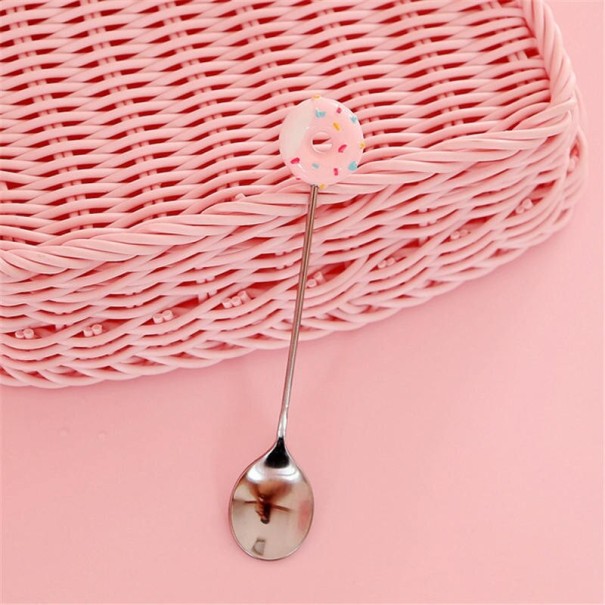 Jälkiruokailuvälineet ja donitsi vaaleanvaaleanpunainen 2