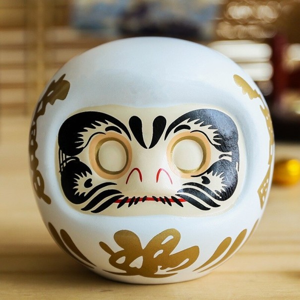 Japans Daruma-beeldje wit