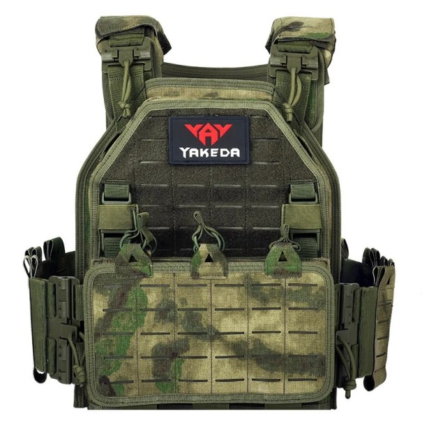 Justerbar taktisk vest med hurtigudløser Skjulte lommer med velcro 4 aftagelige puder Neutrale farver Omkreds 75-125 cm Skuldre 15-20 cm armygrøn