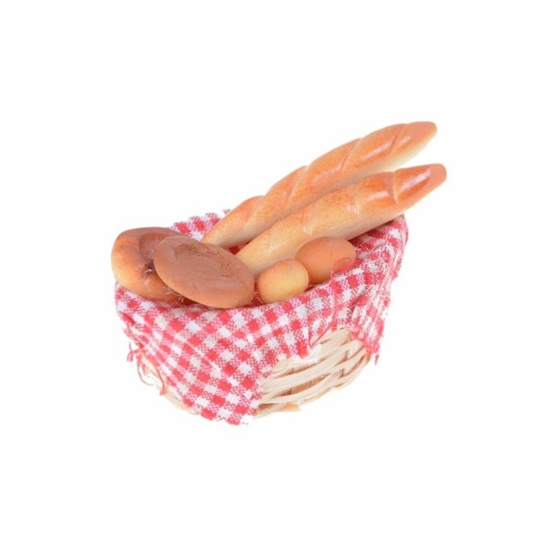Kager i en kurv til en dukke 1