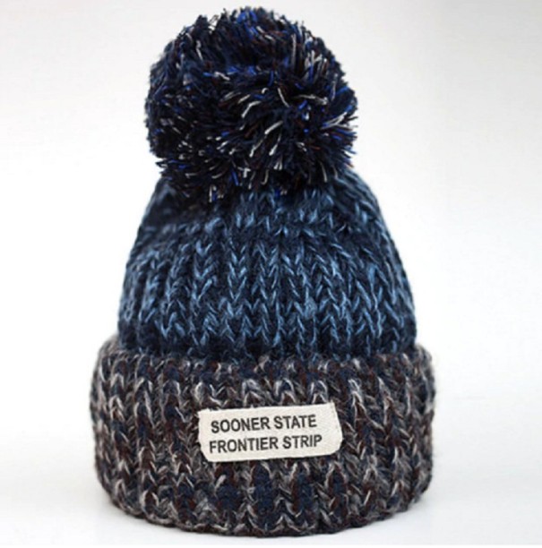 Kinderwintermuts met pompon J864 blauw