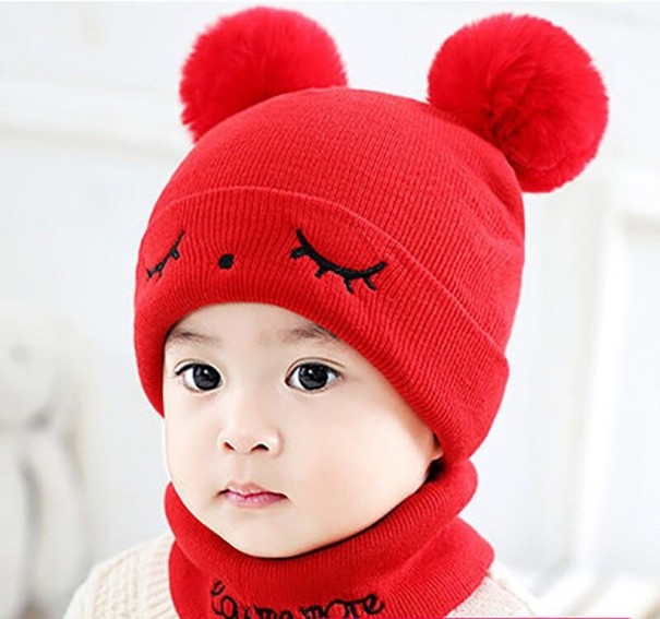 Kinderwintermuts met pompons en nekwarmer lichtblauw