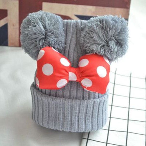 Kinderwintermuts met strik J2468 grijs