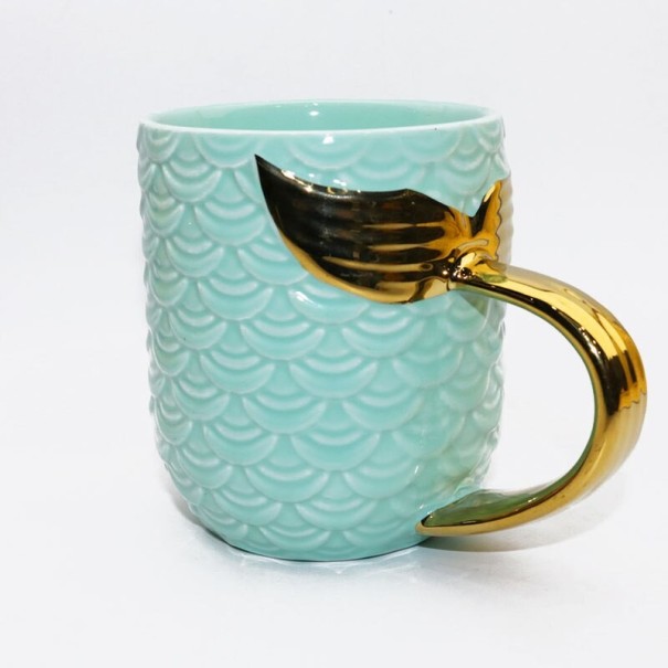 Kubek ceramiczny ze złotymi skrzydłami turkusowy