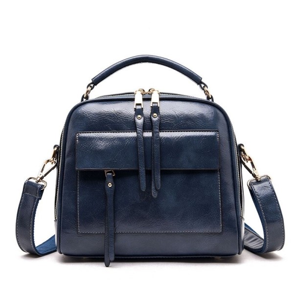 Ladies' handbag for hand or shoulder carry with a top handle Strap with carabiners Front zip pocket Glossy synthetic leather 26 x 22 x 13.5 dark blue