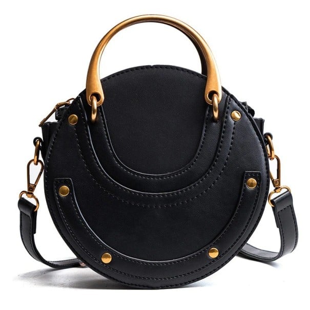 Ladies' round crossbody handbag with a sturdy metal handle Strap with carabiners Decorative stitching and studs PU leather 17 x 16 x 8 cm black