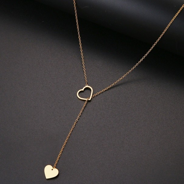 Lange damesketting met hart goud