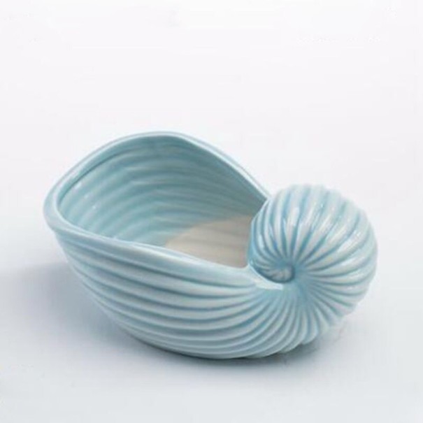Maceta decorativa en forma de concha azul claro 7