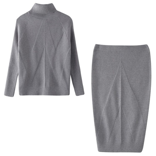 Maglione e gonna da donna grigio