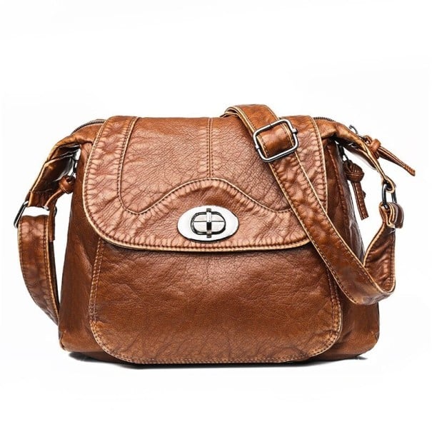 Mala crossbody feminina com aba e fecho rotativo Vários bolsos com fecho Alça ajustável Aspeto vintage em pele PU 25 x 23 x 15 cm castanho