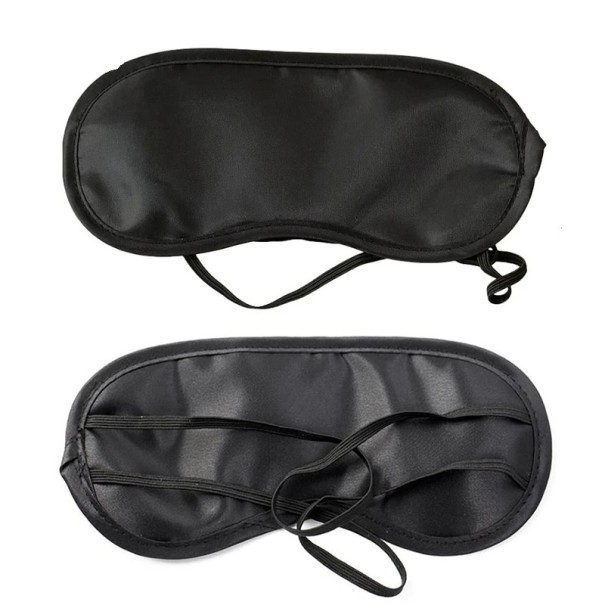 Máscara para dormir sobre los ojos hecha de material suave, moldeada, ligera, ideal para un sueño tranquilo. 1