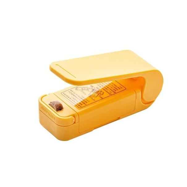 Mini aparat de etanșare cu vid pentru alimente 9 x 3,5 x 3,3 cm Mașină portabilă de etanșare pentru depozitarea alimentelor, alimentată de 2 baterii AA. galben