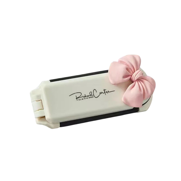 Mini faltbarer Reise-Kamm mit Spiegel 11 x 9,5 x 4 cm Weißer faltbarer Massagekamm für Haare mit rosa dekorativem Schleifen 1