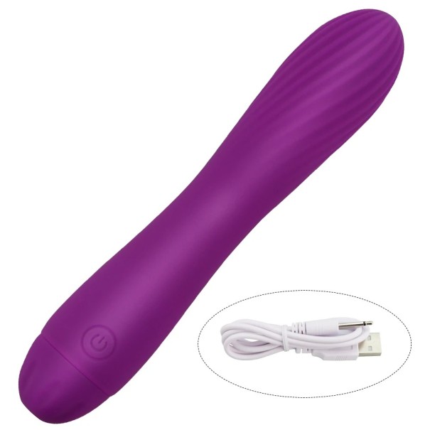Mini vibrador de silicona de 17,2x3,2 cm con superficie estriada y 7 modos de vibración. Carga USB. Resistente al agua. Embalaje discreto. morado