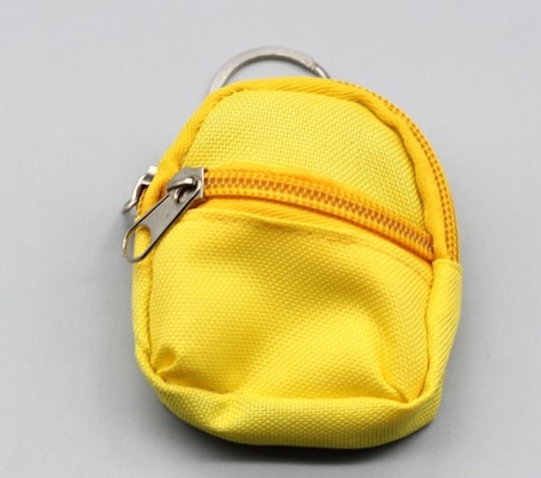 Mochila para muñecas amarillo