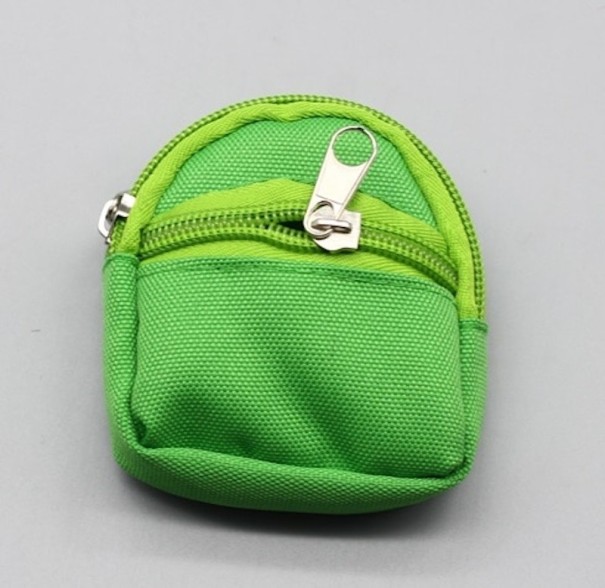 Mochila para muñecas verde
