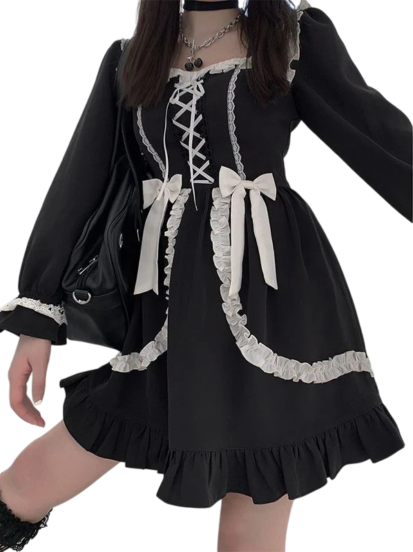 Musta pitsimekko japanilaiseen lolita-tyyliin. Pitkät hihat, koristeellinen nyöritys, röyhelöt, rusetit, elegantti goottilainen retro-cosplay. S