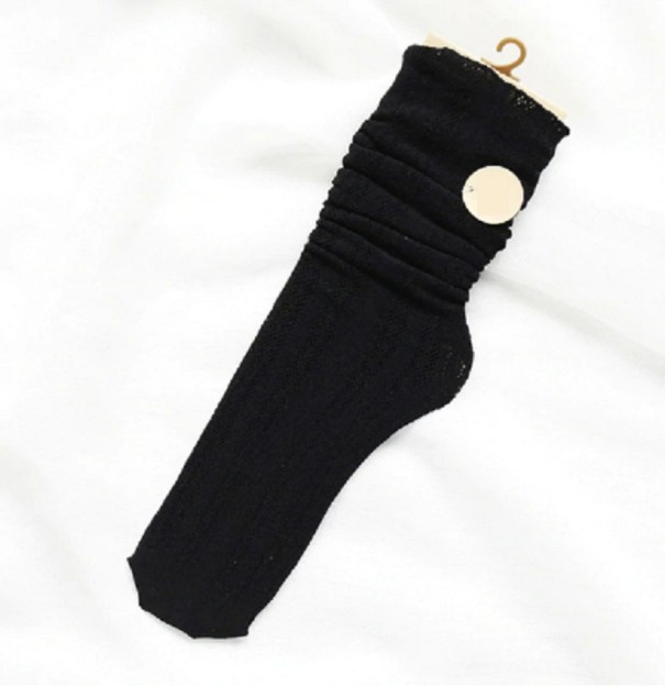 Naisten muotisukat musta