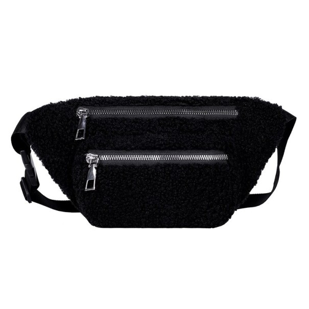 Naisten plyysinen vyölaukku 28 x 15 x 4 cm Pehmeä kihara pinta Kaksi vetoketjutaskua Hopeiset vetimet Hihna soljella Kantaminen vartalon musta