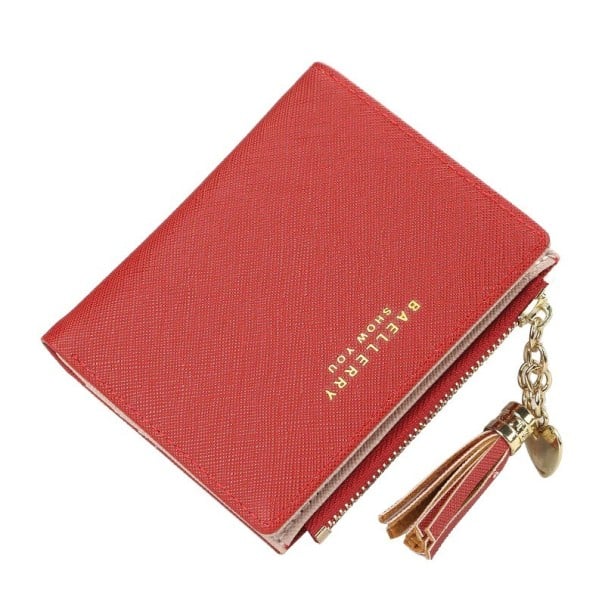 Női kis pénztárca pomponnal és arany szív alakú kulcstartóval Zip az oldalán Műbőr finom textúrával Méretek 11 x 10 x 1,5 cm piros