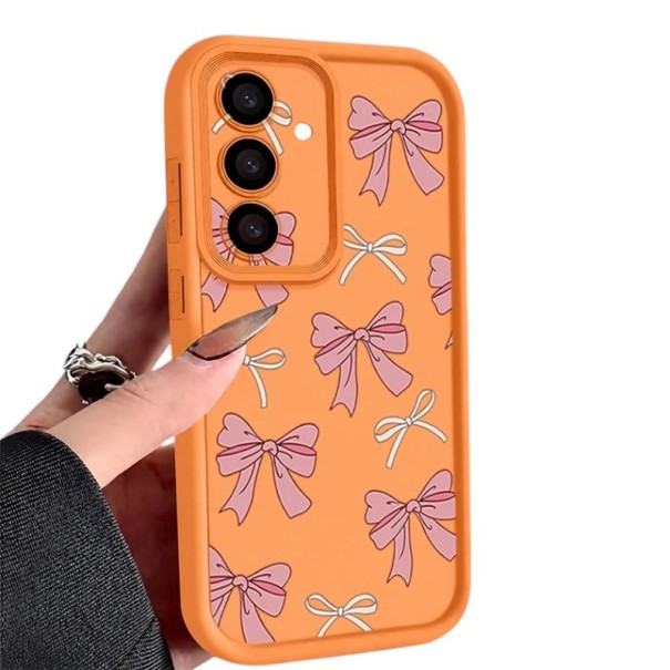 Ochranný silikonový kryt na Samsung Galaxy A36 s motívom mašličiek v dvoch veľkostiach Vyvýšený rám fotoaparátu Vyšší obvod Matný povrch oranžová