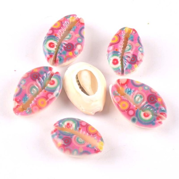 Ozdobne muszelki z ornamentami 10 szt 10
