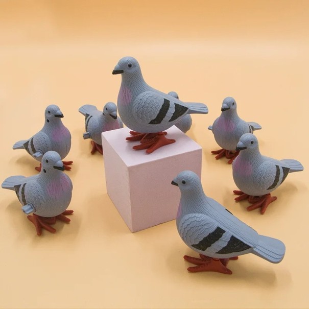 Paloma de cuerda 10 cm Juguete de plástico para niños Sin pilas Movimiento de salto Motivo animal Versión en blanco o gris gris