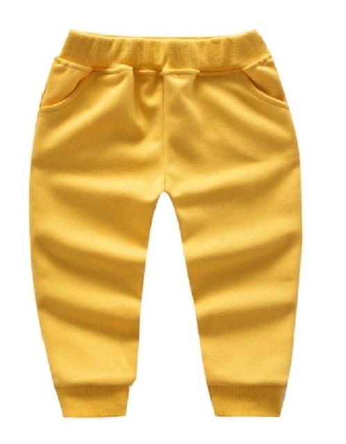 Pantaloni de trening din bumbac pentru băieți J904 galben 12-18 luni