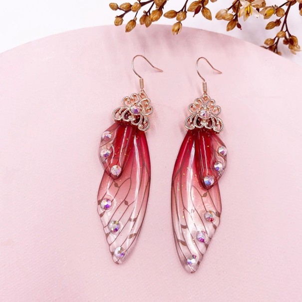 Pendientes colgantes de alas para mujer 16