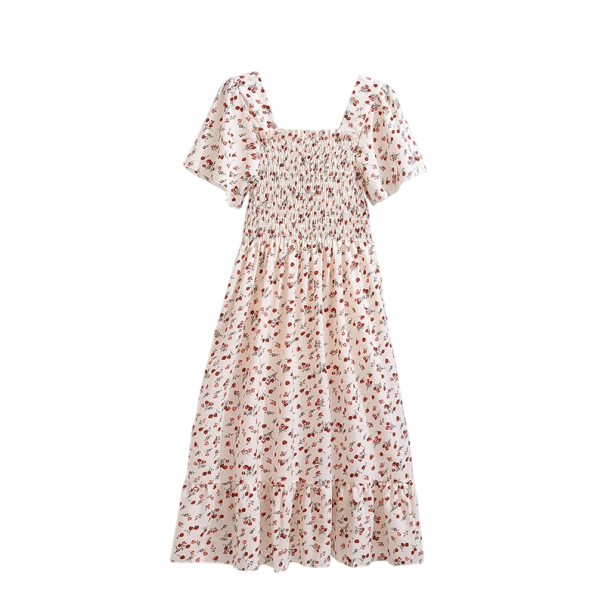 Pitkä kukkakuvioinen mekko, jossa röyhelöinen yläosa ja helma. Romanttinen kesämekko, jossa lyhyet hihat ja neliönmuotoinen pääntie. beige