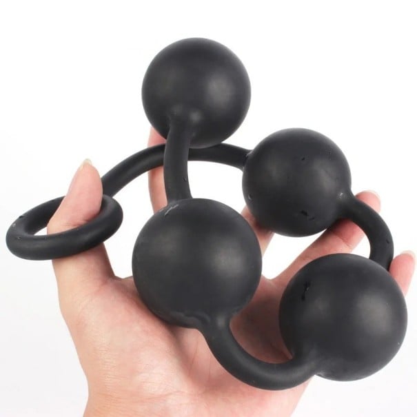 Plug anal en silicone taille L 5 cm avec poignée ronde forme ergonomique matériau souple flexible facile à nettoyer gels lubrifiants spéciaux 1